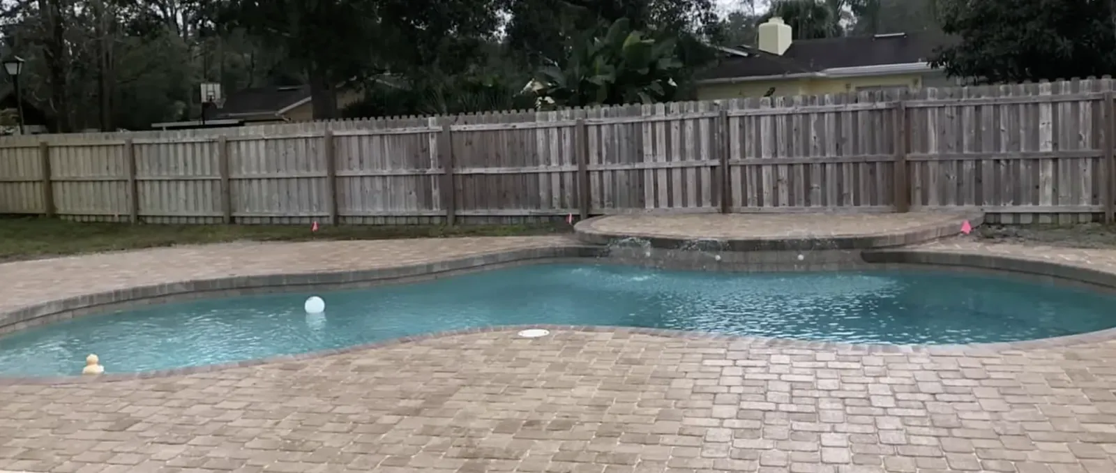Tan and cream paver pool deck in Orlando